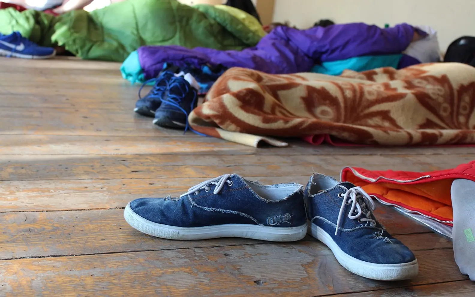 Shoes, sleeping bag and youth